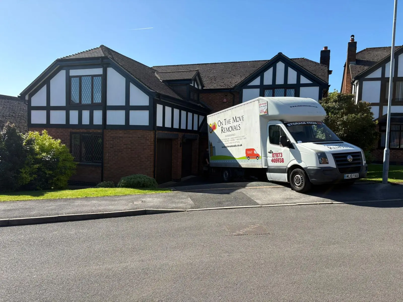 On The Move Removals van outside a detached Bradford home on moving day