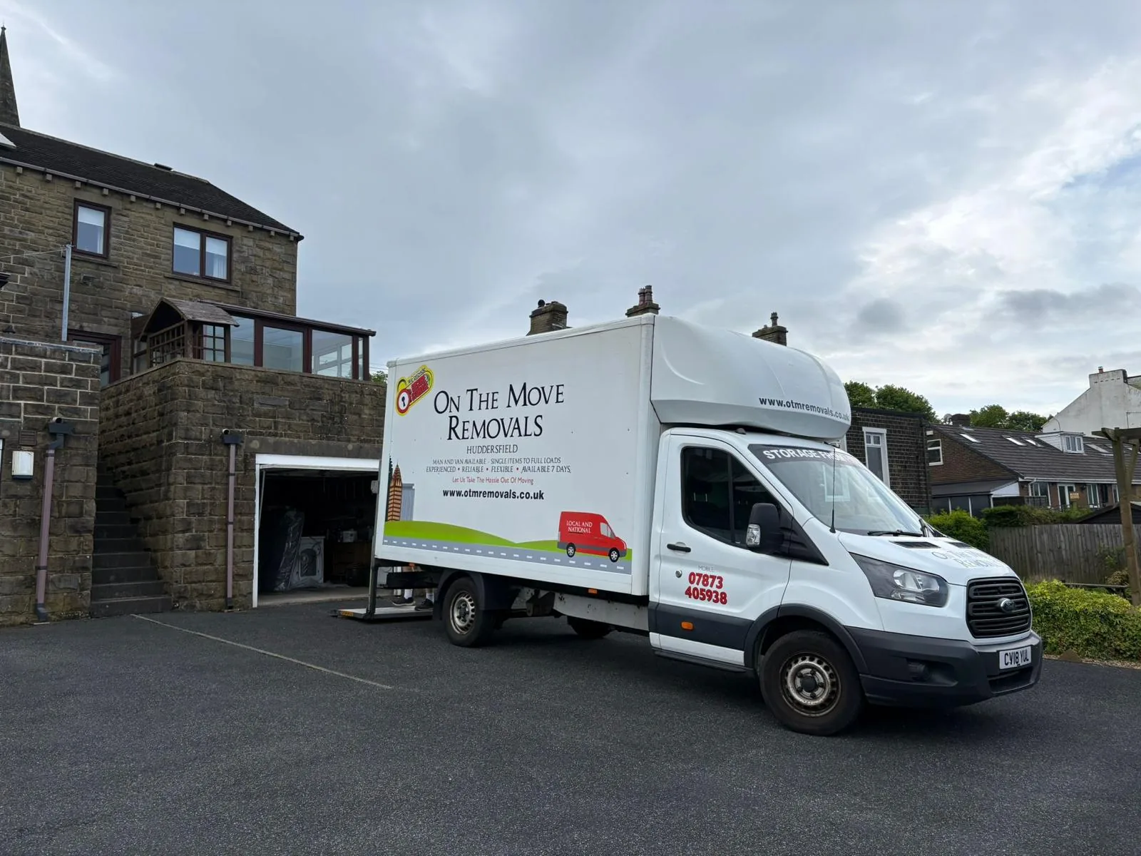 On The Move Removals Luton van on a driveway during a house move in Cayton near Scarborough