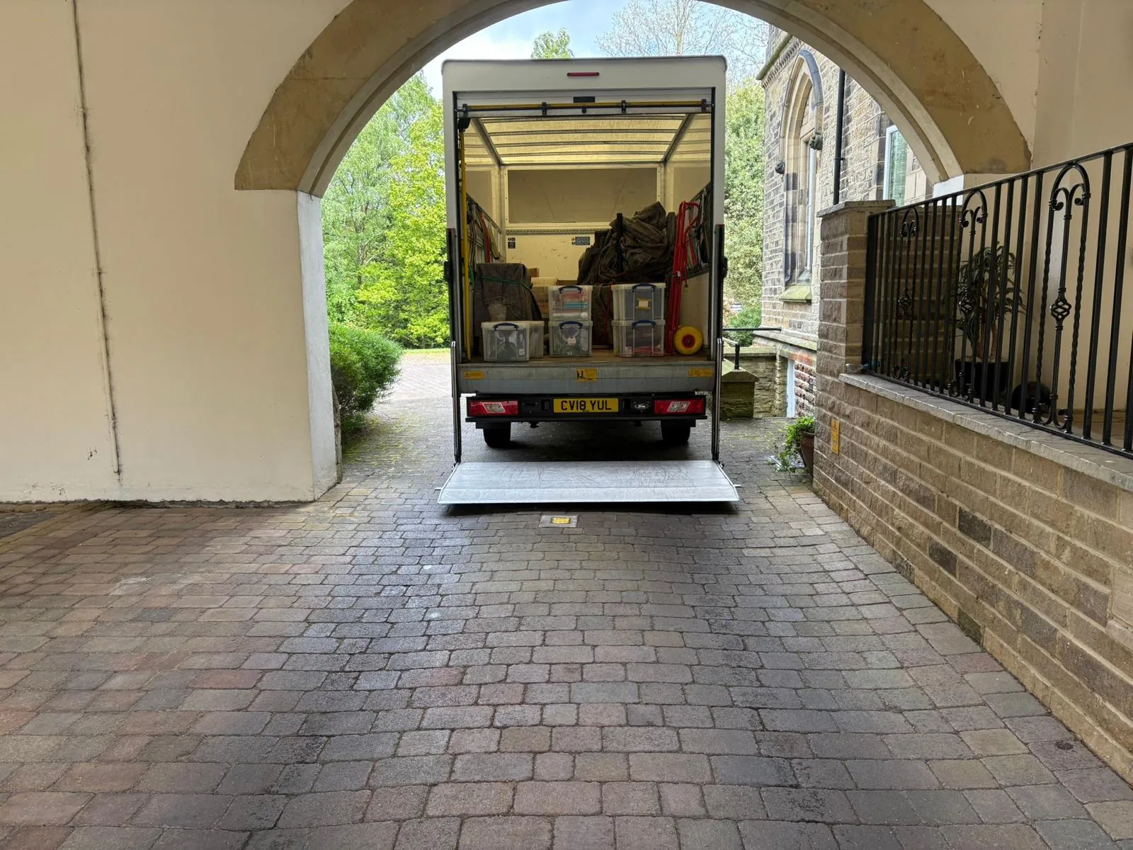 On The Move Removals Luton van parked on a residential street in Meltham, Huddersfield