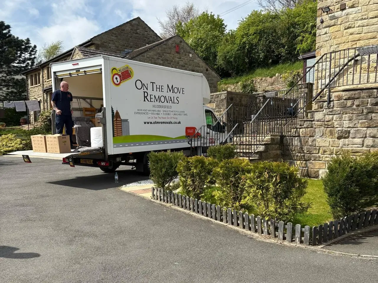 Shaun from On The Move Removals on a van tailgate in Huddersfield ready for a long-distance Scotland move