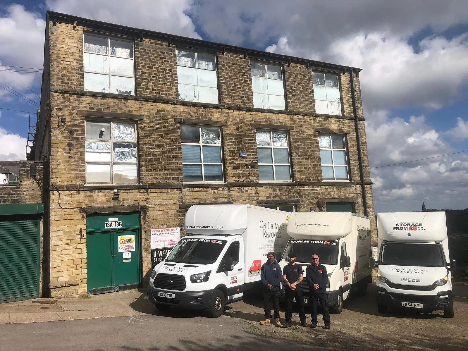 OTM Removals team with vans in Huddersfield